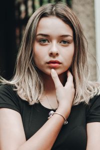 What are the next steps after a positive pregnancy test result?