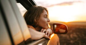 Woman thinking with a concerned expression, wondering when she should take a pregnancy test